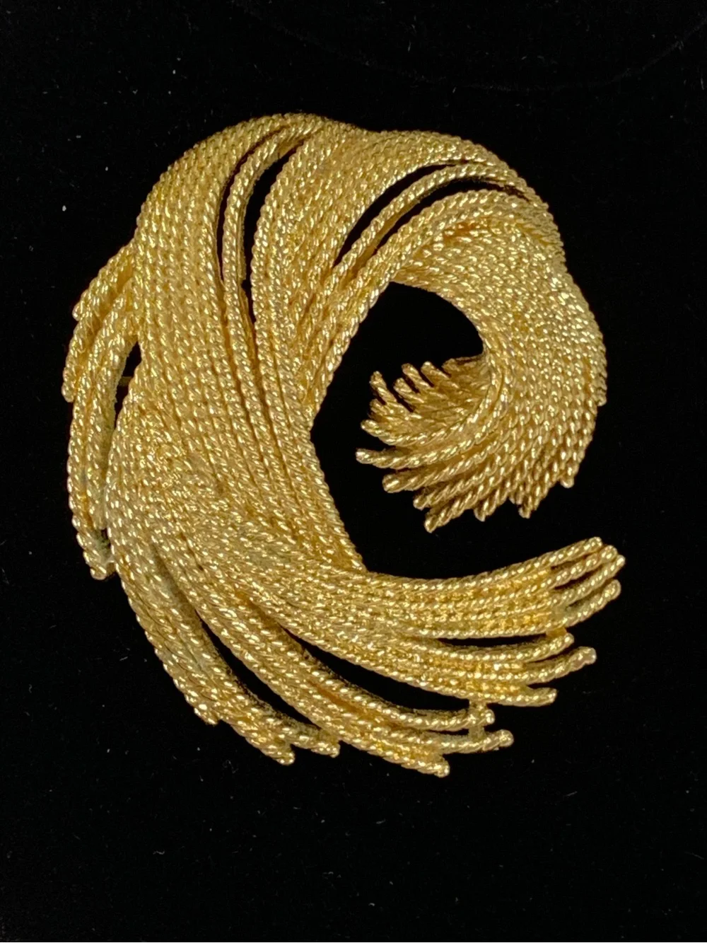 Vintage Monet Gold Tone Textured Swirl Brooch